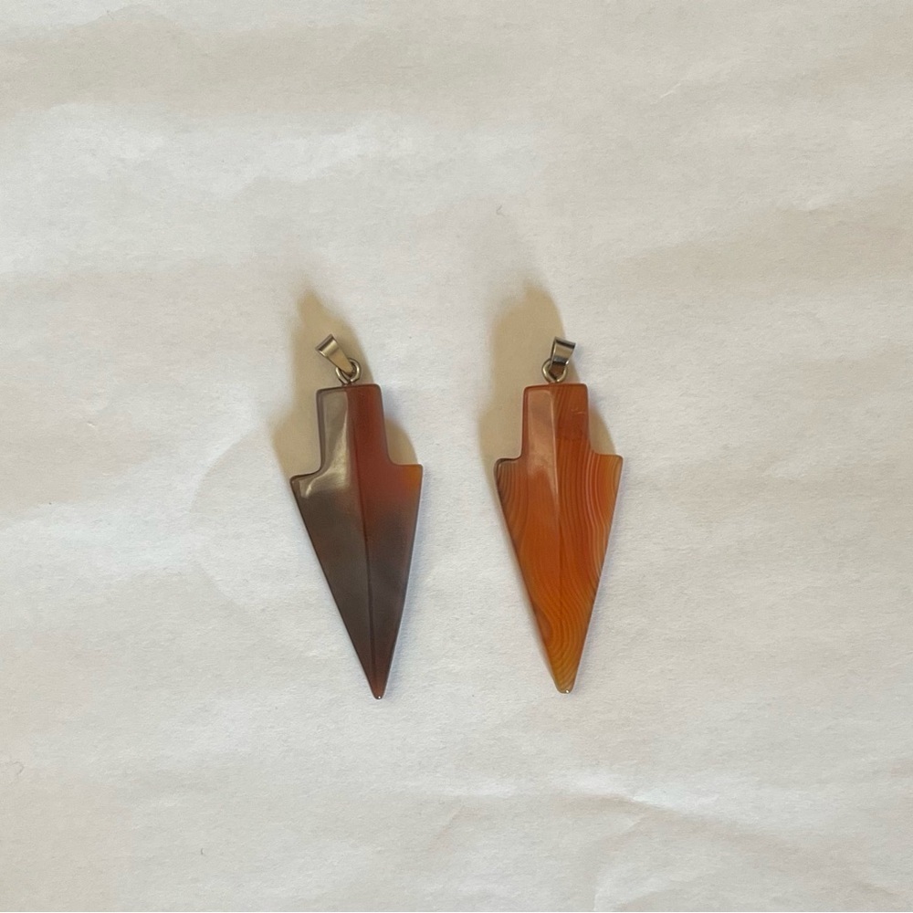Hand caved Arrowhead pendants